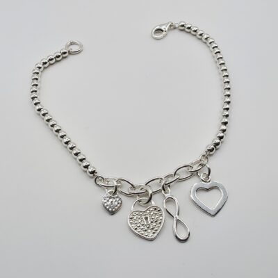 Pulsera corazones e infinito Plata.925