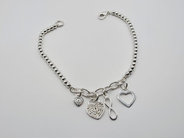 Pulsera corazones e infinito Plata.925