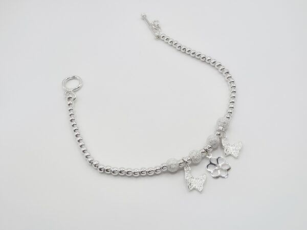 Pulsera bolitas dijes mariposas Plata.925